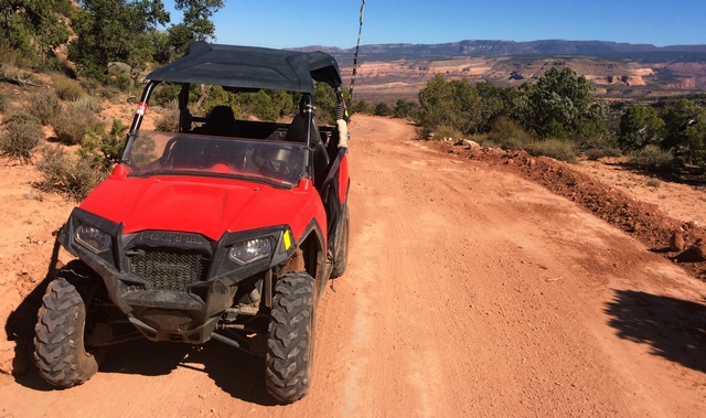Photo 3. The RZR parked along the Kokopelli Bike Trail (actually a well-graded road with only occasional rough sections). Photo  by Dave Casler. Taken from  38 ° 42' 32.08" N 109 ° 9' 44.03" W.